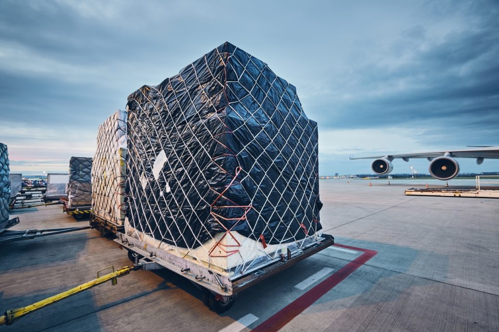 airport-at-dusk-loading-of-cargo-containers-to-ai-2023-11-27-05-11-17-utc_Easy-Resize.com